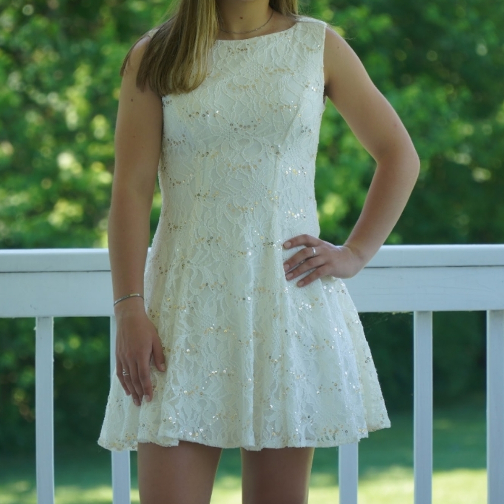 White dress with gold and silver sequins